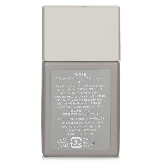 THREE Solar getönte Glow Flow Flüssiggrundierung LSF 50 – Nr. 01, 30 ml