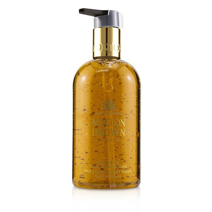 Molton Brown – Mesmerising Oudh Accord &amp; Gold – Feine flüssige Handwäsche, 300 ml/10 oz