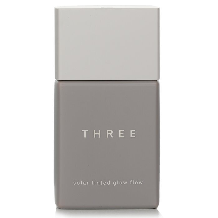 THREE Solar getönte Glow Flow Flüssiggrundierung LSF 50 – Nr. 02, 30 ml