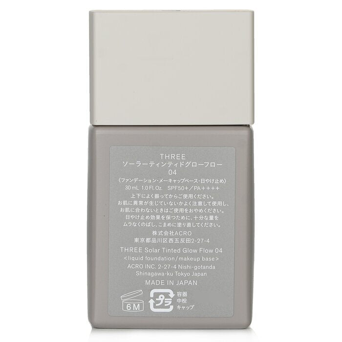 THREE Solar getönte Glow Flow Flüssiggrundierung LSF 50 - Nr. 04 30 ml